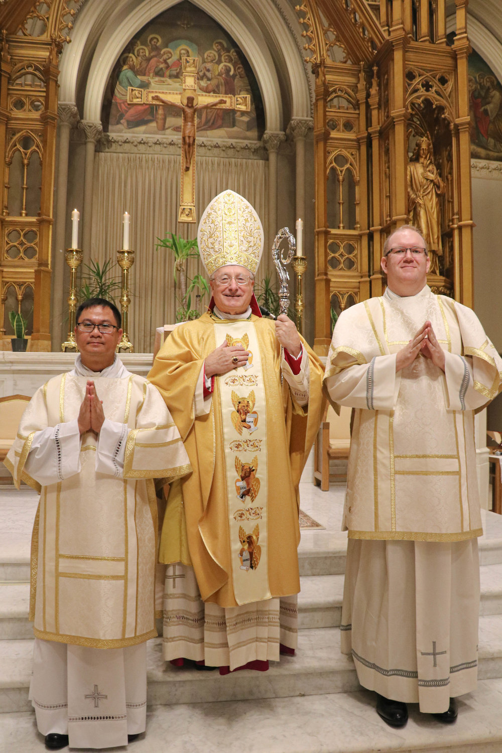 Rev. Mr. Daniel M. Mahoney and Rev. Mr. Doan V. Nguyen are ordained to the Sacred Order of Deacon through the imposition of hands and the invocation of the Holy Spirit, by Auxiliary Bishop Robert C. Evans on Saturday, Sept. 26 at the Cathedral of Saints Peter and Paul, Providence.